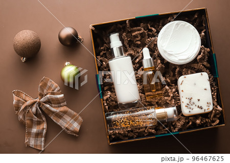 Christmas gift set, xmas holidays beauty box subscription package and luxury skincare products flatlay, cosmetic flat lay on brown background, cosmetics as holiday present or shopping delivery, top 96467625