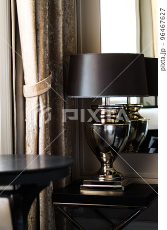 Home decor and interior design, luxury lamp and coffee table in elegant classic styled room, furniture and decoration details 96467627