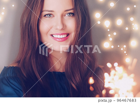 Holiday magic, Christmas and New Year celebration, happy woman with sparklers, portrait 96467683