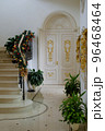 Christmas decorations in the hall of luxurious home with marble stairs and floor 96468464