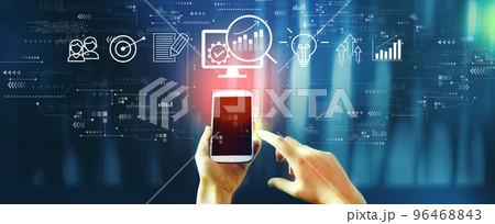 Marketing Strategy concept with person using smartphone Marketing Strategy concept with person using smartphone 96468843