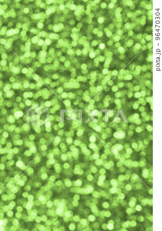 Blurred lime green decorative sequins. Background image with shiny bokeh lights from small elements 96470304