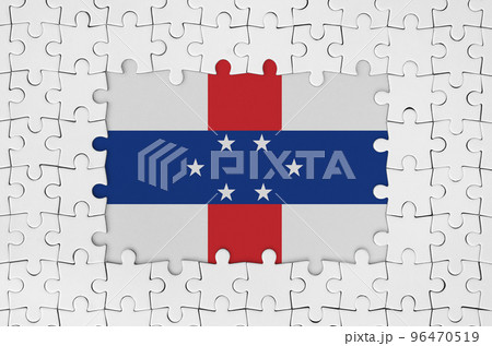 Netherlands Antilles flag in frame of white puzzle pieces with missing central part 96470519