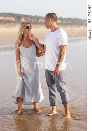 Fond wife and husband during honeymoon Fond wife and husband during honeymoon 96473190