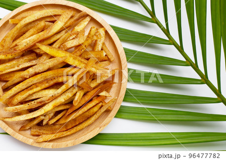 Crispy banana sticks. Fruit snack Crispy banana sticks. Fruit snack 96477782