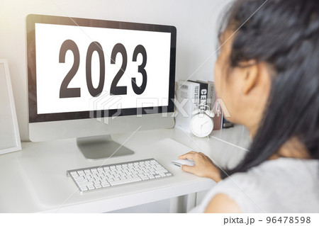 Close-up office worker Asian woman typing on keyboard computer white screen at home office in 2023. Concept of technology, connection, communication. Clipping path on white screen isolated. 96478598
