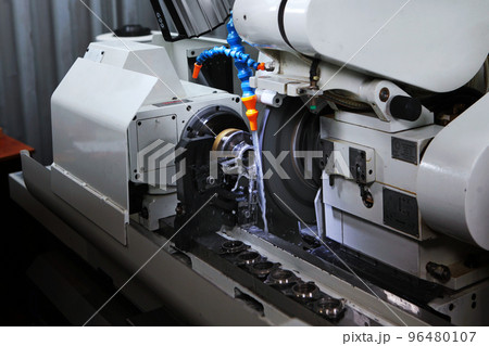 A machine for the manufacture and processing of finished bearings. Production of bearings. Photo on production. A machine for the manufacture and processing of finished bearings. Production of bearings. Photo on production. 96480107