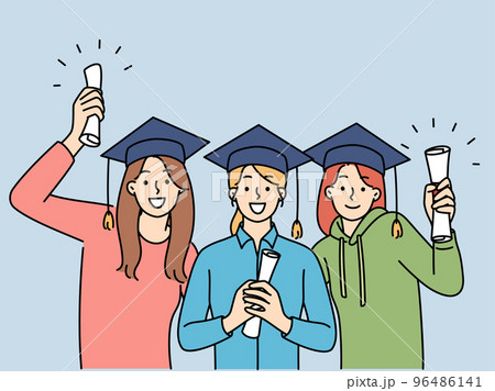 Happy girls holding graduation diplomas  96486141