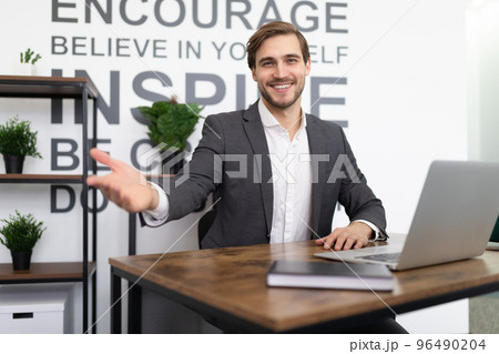 HR manager welcomes a new employee in the office 96490204