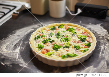 Homemade quiche with red fish, salmon, broccoli and cheese Homemade quiche with red fish, salmon, broccoli and cheese 96491590