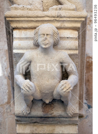 The sculpture, decoration on the St Mark s Church in the historic city Korcula at the island Korcula in Croatia 96493236