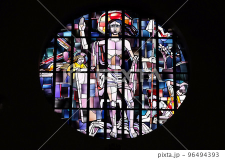Saint Lawrence of Rome stained glass window in the Saint Lawrence church in Kleinostheim, Germany 96494393