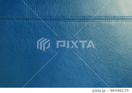 Blue leather, leatherette texture background wtih decorative stich 96496270