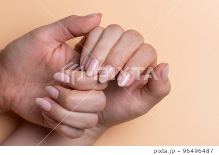 Elegant hands of woman with pretty nails 96496487