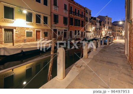 Traditional Venetian houses with the old town along the canal at dawn. Traditional Venetian houses with the old town along the canal at dawn. 96497953