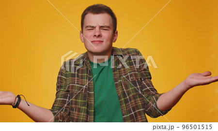 Man raising hands in indignant expression asking why what reason of failure demonstrating disbelief 96501515