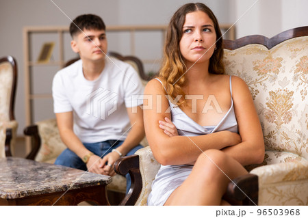 Family quarrel. Couple during conflict in live roome Family quarrel. Couple during conflict in live roome 96503968