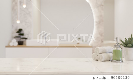 White luxury marble tabletop with copy space over blurred white elegance bathroom background White luxury marble tabletop with copy space over blurred white elegance bathroom background 96509136