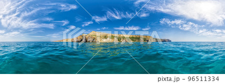 Yachts in the Sea on a background of rocky shores. Sea landscape with yachts and rocky coastline. Copy space. The concept of an summer holydays, relax, active and healthy life in harmony with nature. Yachts in the Sea on a background of rocky shores. Sea landscape with yachts and rocky coastline. Copy space. The concept of an summer holydays, relax, active and healthy life in harmony with nature. 96511334