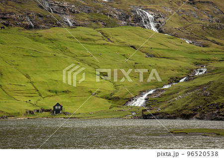 lonely house and waterfalls in saksun area on faroe lonely house and waterfalls in saksun area on faroe 96520538