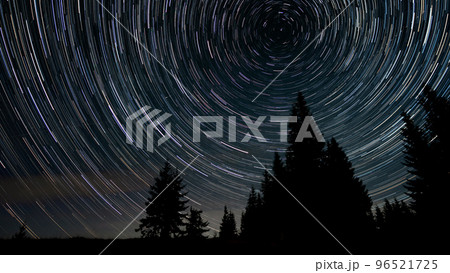Star trails in the night sky 96521725