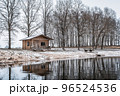 A wooden house in the winter scenery by the lake 96524536