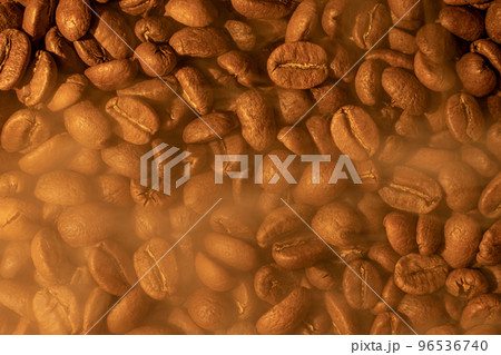 Texture of coffee beans, light soft light and steam from coffee. Texture of coffee beans, light soft light and steam from coffee. 96536740