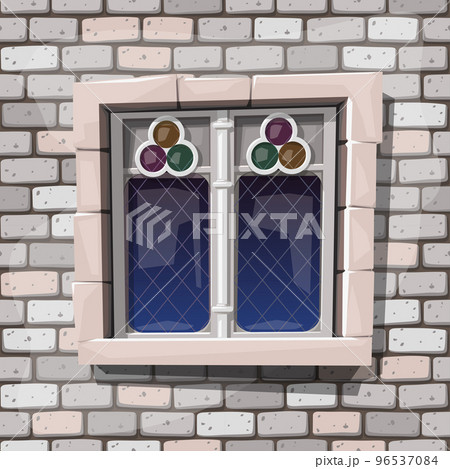 a medieval window on grey stone wall 96537084
