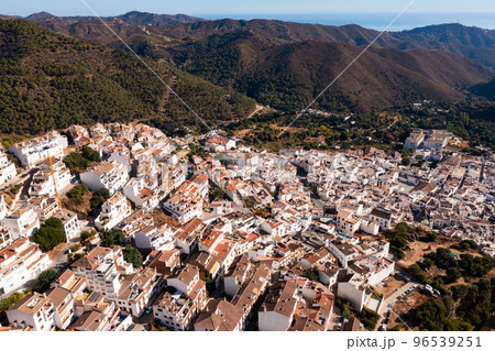 Aerial view of Ojen, white village over a hillside near Marbella, Spain in the spring Aerial view of Ojen, white village over a hillside near Marbella, Spain in the spring 96539251