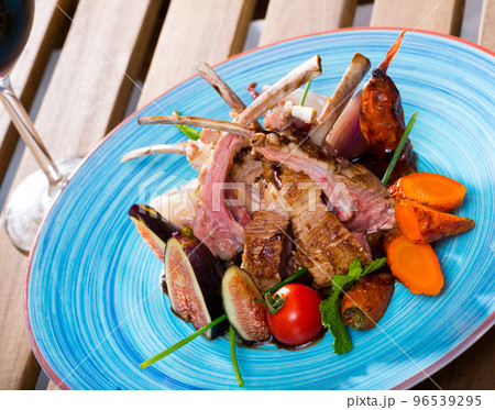 Plate of roasted mutton ribs Plate of roasted mutton ribs 96539295