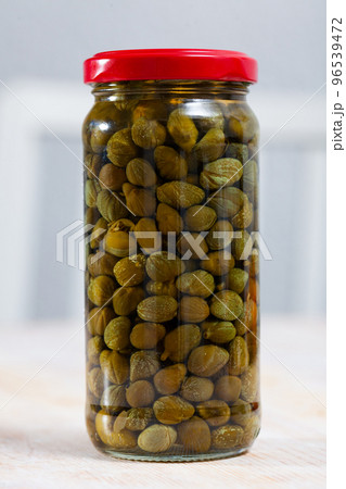 Canned capers in glass jar 96539472