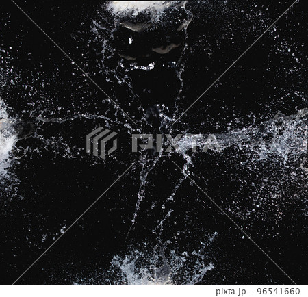 Shape form droplet of Water splashes into drop water attack fluttering in air and stop motion freeze shot. Splash Water for texture graphic resource elements, black background isolated 96541660