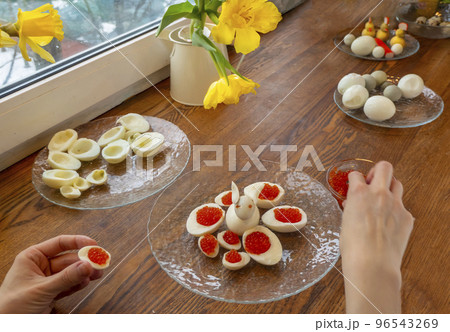 Step by step. egg rabbit figurine for decoration for making stuffed eggs Step by step. egg rabbit figurine for decoration for making stuffed eggs 96543269