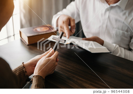 Christians are congregants join hands to pray and seek the blessings of God... Christians are congregants join hands to pray and seek the blessings of God... 96544308