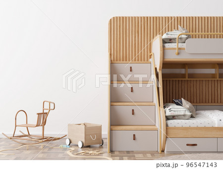 Empty white wall in modern child room. Mock up interior in scandinavian, boho style. Copy space for your picture or poster. Bed, rattan rocking horse, toys. Cozy room for kids. 3D rendering. 96547143