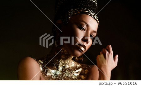 woman queen Cleopatra art photo, creative makeup Black hair 96551016