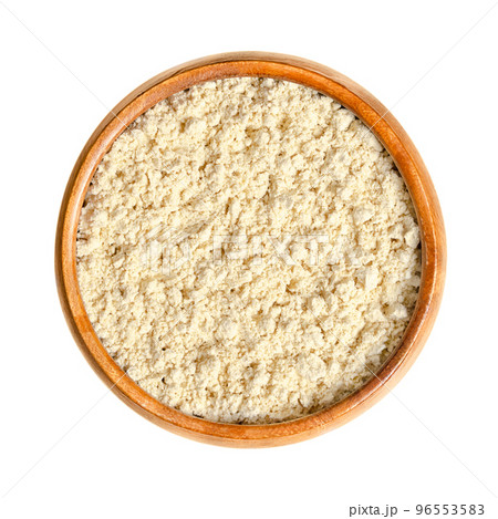 Soy flour, in a wooden bowl. Made of hulled, toasted soybeans, finely ground into a flour. Used for cooking or as the starting material for production of soy concentrate and soy protein isolate. Soy flour, in a wooden bowl. Made of hulled, toasted soybeans, finely ground into a flour. Used for cooking or as the starting material for production of soy concentrate and soy protein isolate. 96553583