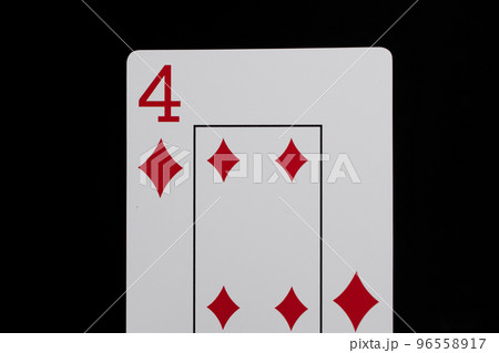 Playing cards on a black background 96558917