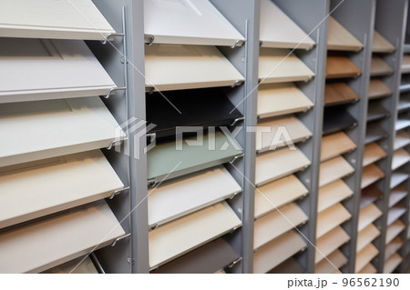 Exposition of ceramics in a showroom new tiling option for floors and walls for home building improvement works. Exposition of ceramics in a showroom new tiling option for floors and walls for home building improvement works. 96562190