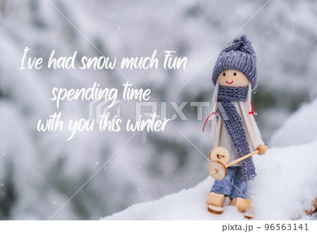 Inspiration joke quote phrase I have had snow much fun spending time with you this winter Angel gnome in scarf and knitted hat skiing on snowy fir branch Elf toy on skis in snowy landscape New year 96563141