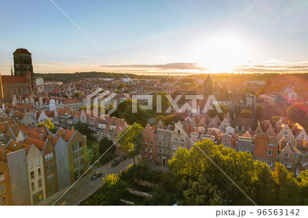 Beautiful architecture of old town in Gdansk, Poland at sunny day. Aerial view from drone of the Main Town Hall and St. Mary Basilica. City Architecture from Above. Europe Beautiful architecture of old town in Gdansk, Poland at sunny day. Aerial view from drone of the Main Town Hall and St. Mary Basilica. City Architecture from Above. Europe 96563142