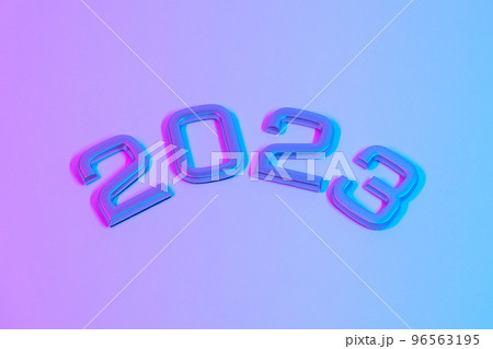 The numbers 2023 in neon light. New Year 2023 on a The numbers 2023 in neon light. New Year 2023 on a 96563195