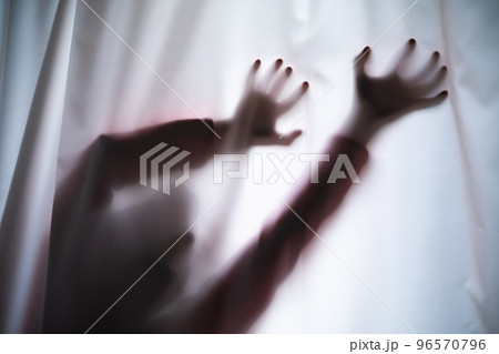 Depressed Man with mantal problems hiding above the curtain. Depressed Man with mantal problems hiding above the curtain. 96570796