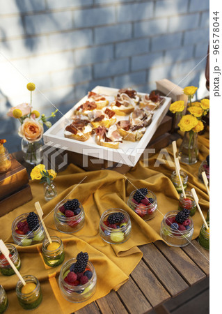 Backyard barbeque party at summer, elegant decoration, luxury catering 96578044