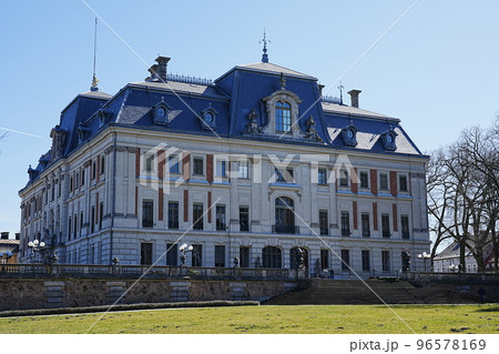 Grass field and neo baroque palace at park of Pszczyna city in Poland Grass field and neo baroque palace at park of Pszczyna city in Poland 96578169