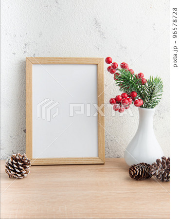White blank wooden frame mockup with Christmas decorations White blank wooden frame mockup with Christmas decorations 96578728