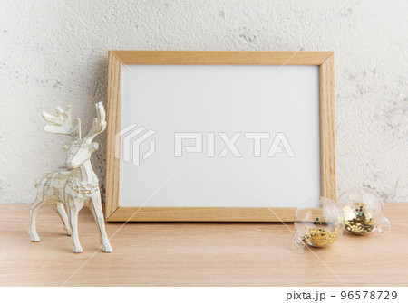 White blank wooden frame mockup with Christmas decorations 96578729