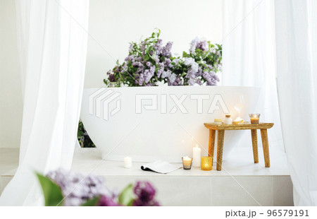 Modern bath room and spa center on the white tub wooden table Modern bath room and spa center on the white tub wooden table 96579191