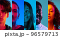 Cropped portraits of young people, men and women expressing different emotions over multicolored background in neon light. Collage made of 5 models looking at camera. 96579713