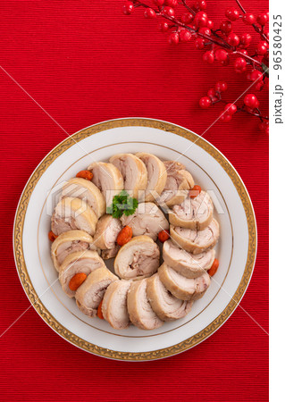 Delicious sliced chicken roll soaked in Chinese wine for lunar new year's dishes. Delicious sliced chicken roll soaked in Chinese wine for lunar new year's dishes. 96580425
